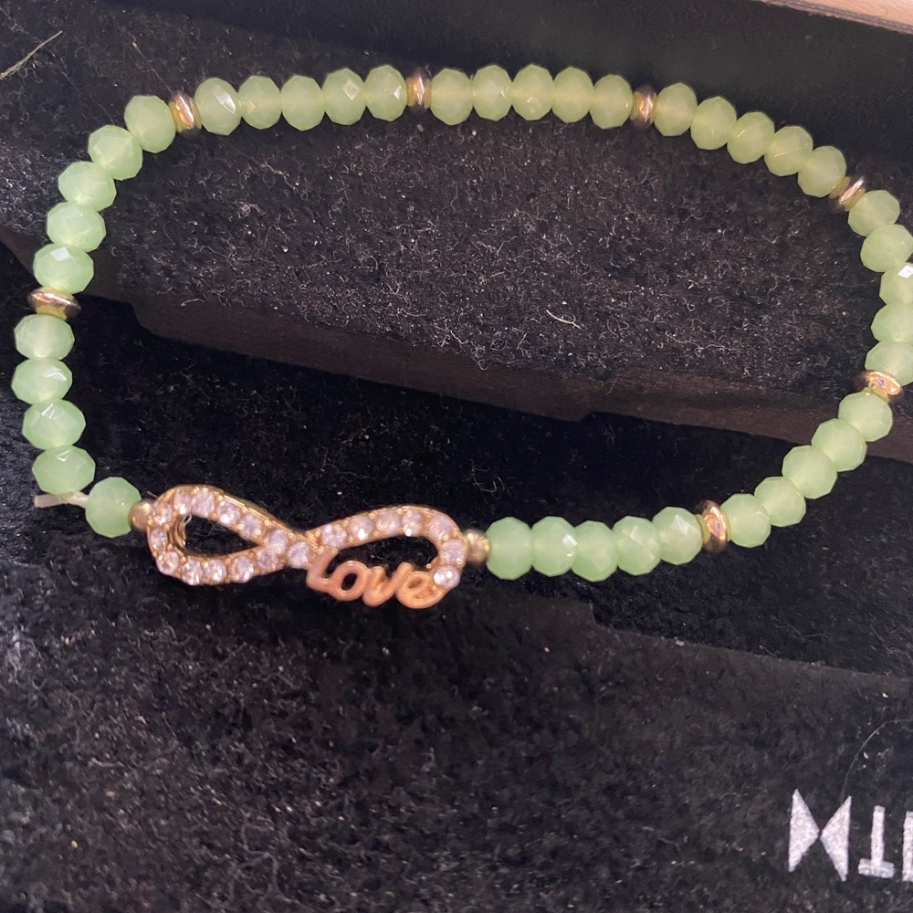 Jade and silver bracelet With infinity love symbol